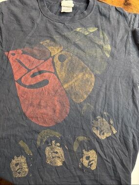 the Rolling Stones Black T‑Shirt with Red and Yellow Graphic